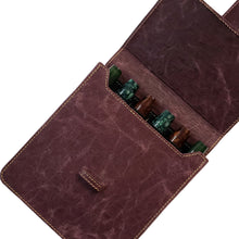 Load image into Gallery viewer, The Franklin-Christoph New Penvelope 6 NWF is a brown leather pouch with flap, perfect for storing pens or chess pieces.