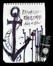Load image into Gallery viewer, Sketchbook with anchor drawing using Classic Black bottled fountain pen ink sits beside a Franklin-Christoph Bottled Ink glass bottle.