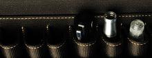Load image into Gallery viewer, Top view of three items in a Franklin-Christoph Penvelope Lucky 13 black leather case with brown stitching.