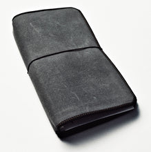 Load image into Gallery viewer, A charcoal gray Franklin-Christoph Vagabond Notebook Cover with black elastic on a white background.