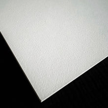 Load image into Gallery viewer, Close-up of Franklin-Christoph Water Color Paper - Loose Leaf, cold press texture, on a black surface.
