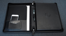 Load image into Gallery viewer, Franklin-Christoph Zippered Padfolio - Black Leather open with pen, notepad, iPhone &amp; cards on gray fabric.