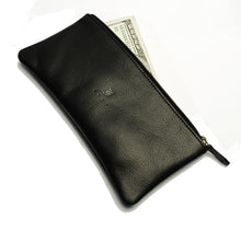 Load image into Gallery viewer, Franklin-Christoph Currency Case - Leather, black with zip closure, shows a $100 bill partially sticking out.