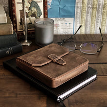 Load image into Gallery viewer, Franklin-Christoph New Penvelope 6 Boot Brown Leather, on black notebook with glasses, candle, map, and books.