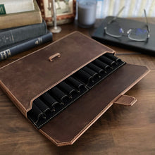 Load image into Gallery viewer, Franklin-Christoph New Penvelope 12 Boot Brown Leather with removable inserts sits on a desk near books and glasses.