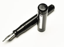 Load image into Gallery viewer, Franklin-Christoph Model 20p pocket Fountain Pen in Classic Black, silver nib and clip, uncapped on white background.