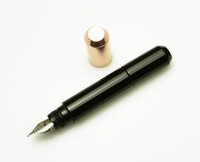 Load image into Gallery viewer, Franklin-Christoph Model 25 pocket Fountain Pen - Copper Black SE with silver nib, copper cap, on white background.