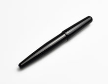 Load image into Gallery viewer, A Franklin-Christoph pocket 66 Fountain Pen - Black Cathedral rests diagonally on a plain white background.
