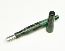 Load image into Gallery viewer, Franklin-Christoph pocket 66 FP - Spanish Moss SE, cap off and next to pen, silver nib, marbled green acrylic.